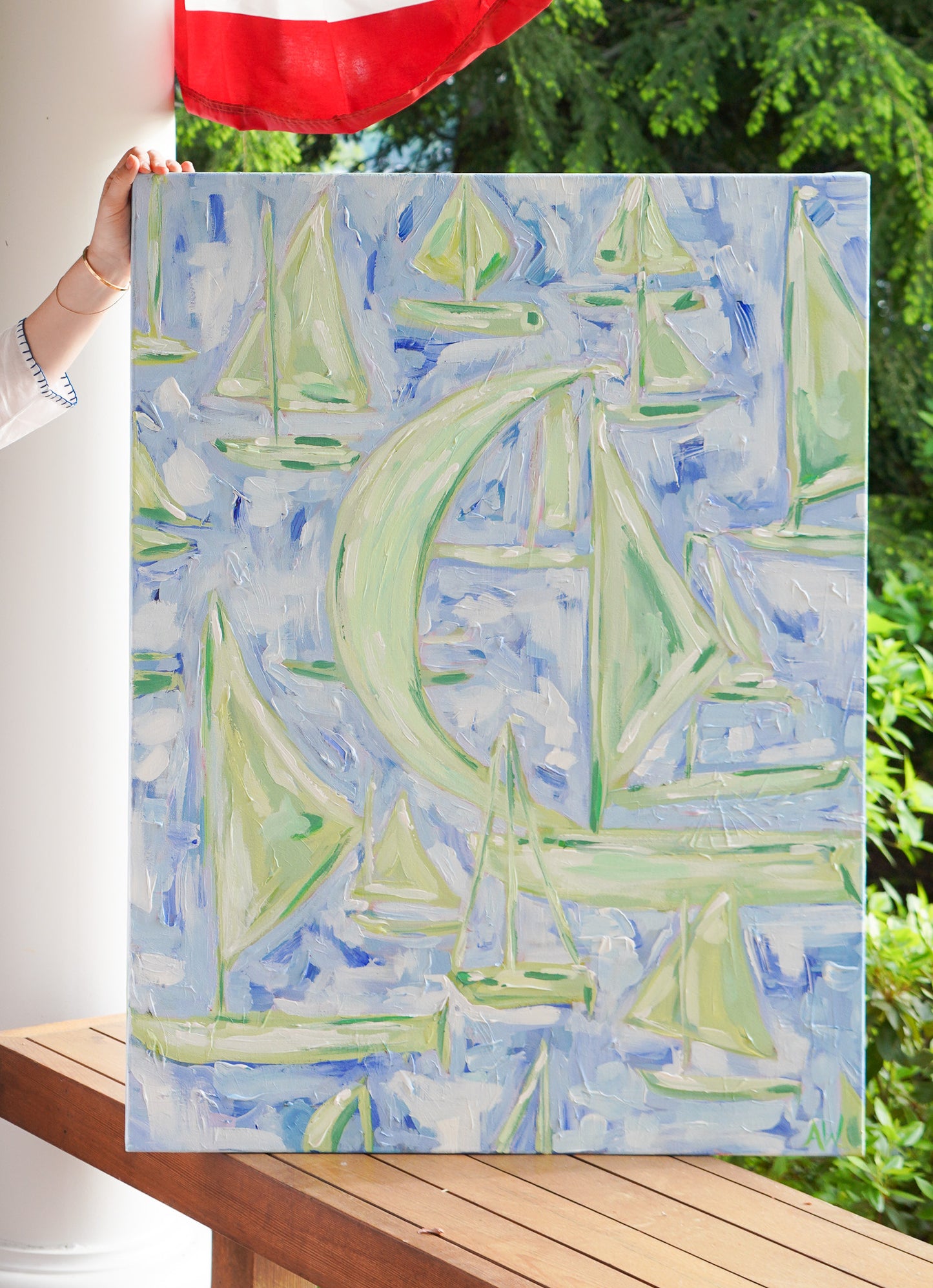 Abstract painting titled Walloon featuring sailboats on Walloon Lake, Michigan, with soft blues and greens, capturing the serene beauty of lakeside summer living.