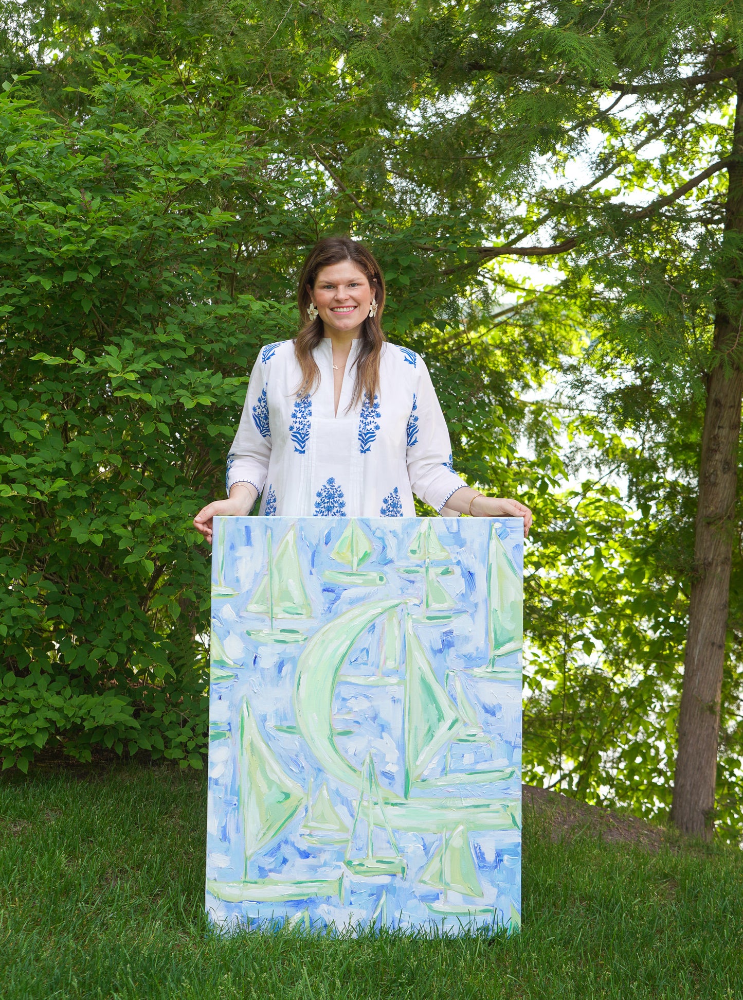 Abstract painting titled Walloon featuring sailboats on Walloon Lake, Michigan, with soft blues and greens, capturing the serene beauty of lakeside summer living.