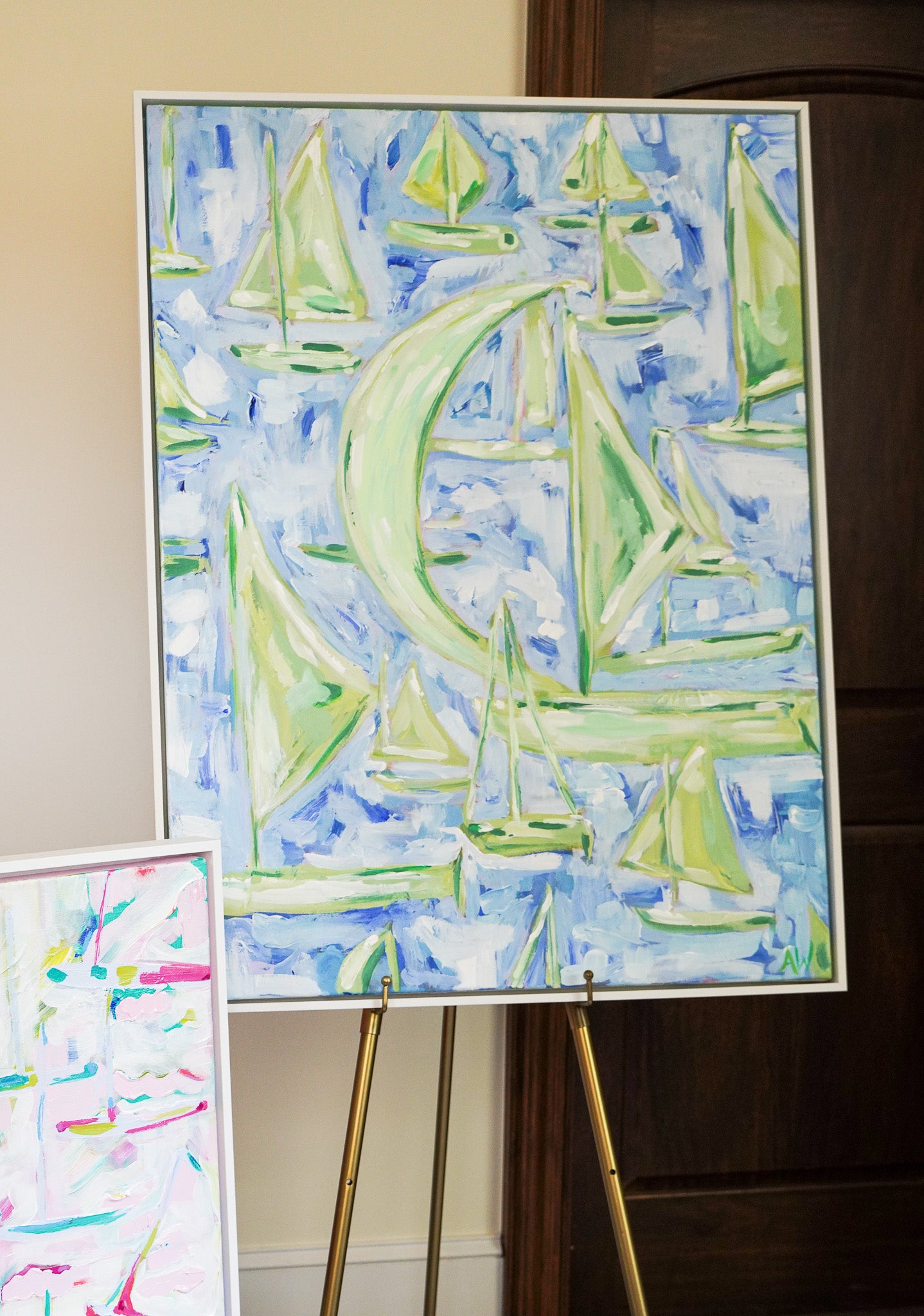 Abstract painting titled Walloon featuring sailboats on Walloon Lake, Michigan, with soft blues and greens, capturing the serene beauty of lakeside summer living.