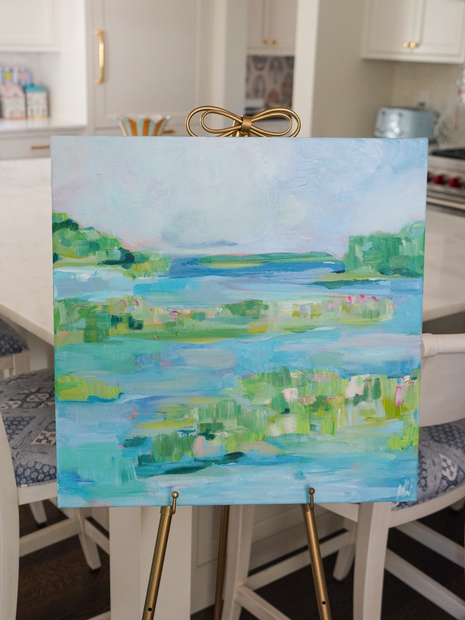 Abstract painting titled The Point featuring a serene waterway and lush greenery with soft blues, greens, and hints of pink, inspired by Michigan’s natural landscapes.